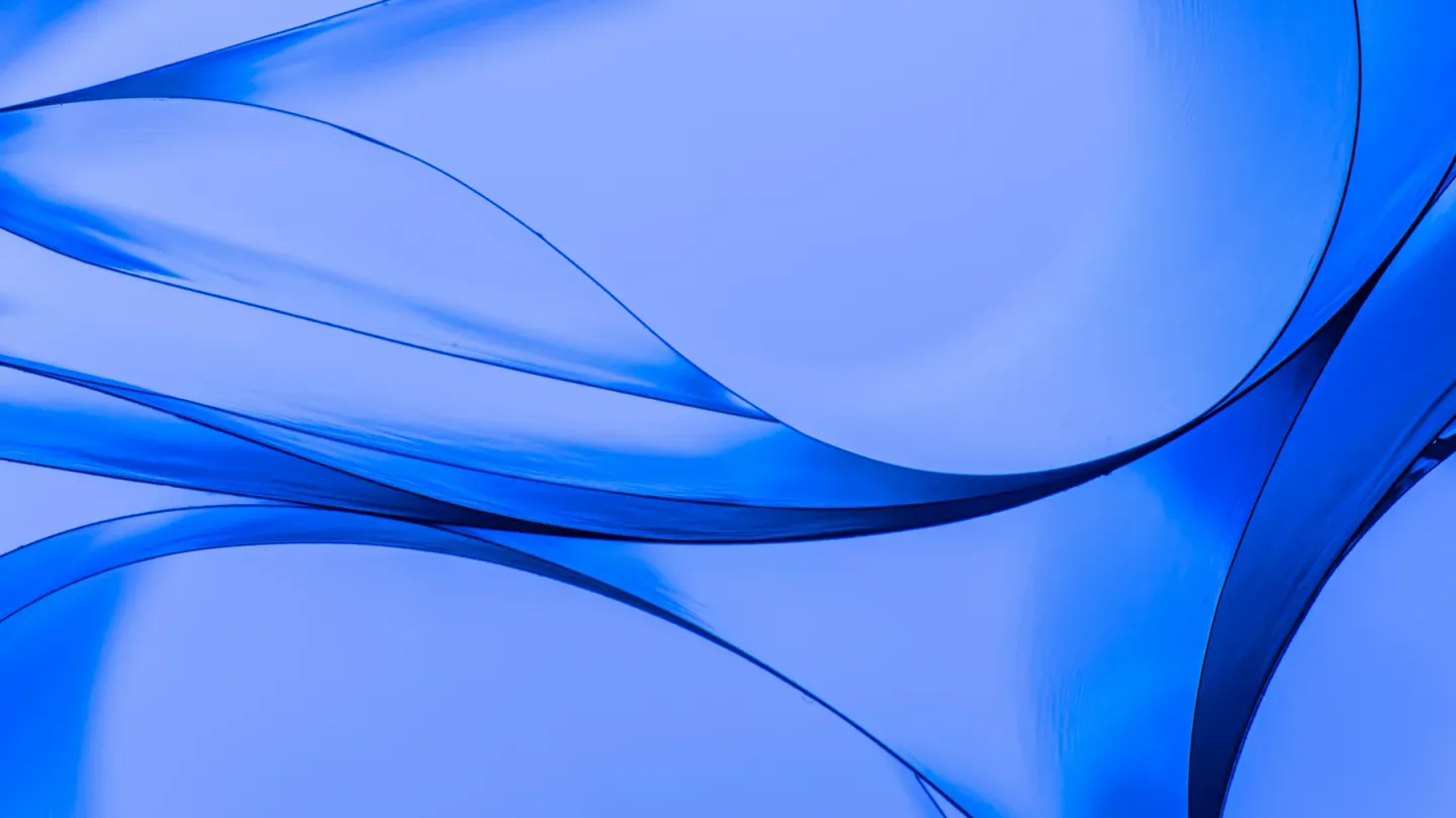 Layered translucent blue forms crossing an abstract composition
