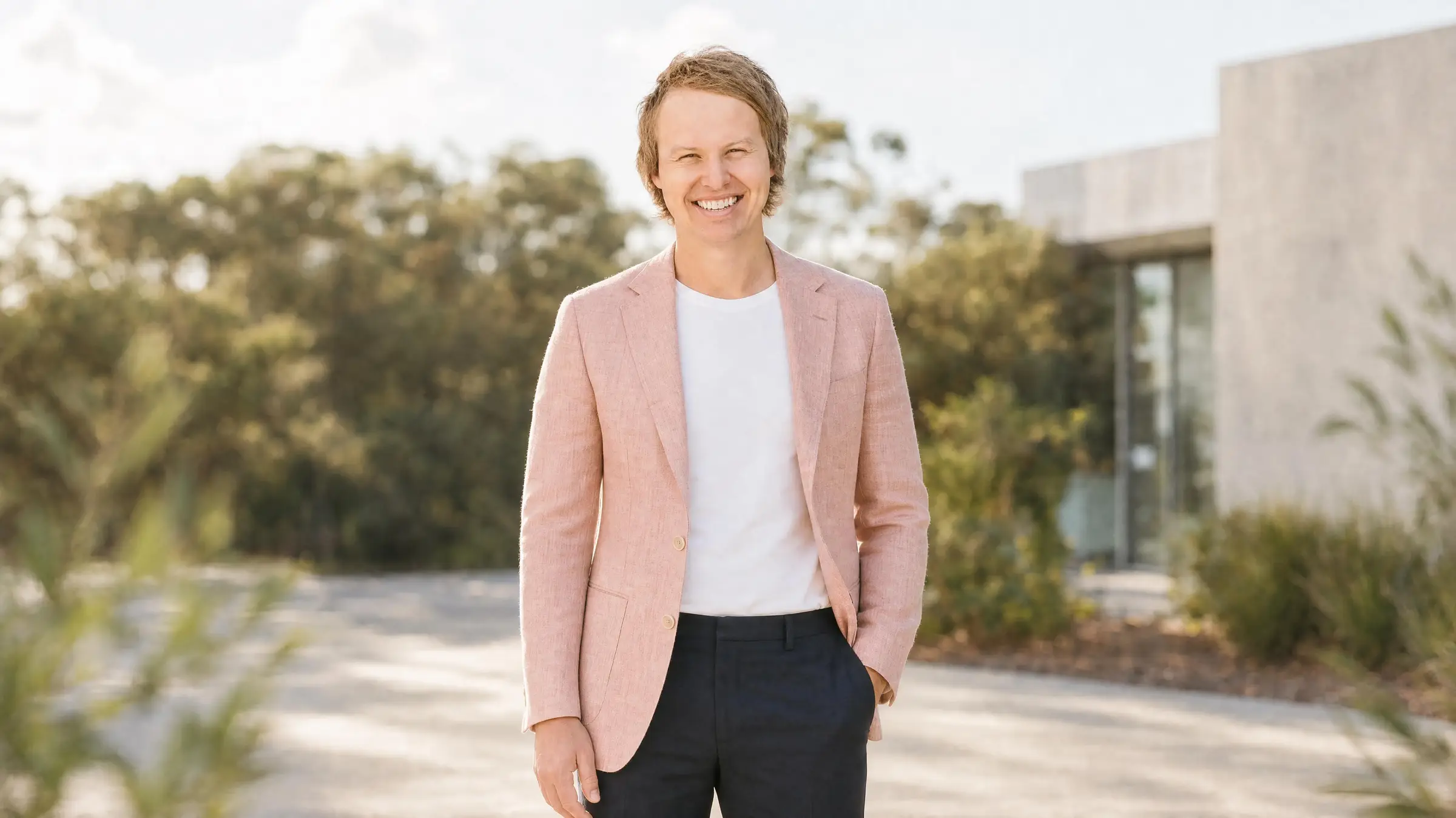 Casey Jones, director of Medical Marketing Group, outside a modern clinic.